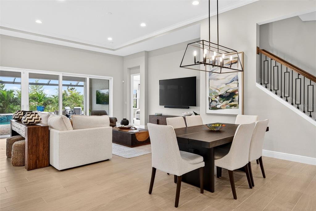 11523 Gleaming Terrace Venice, FL 34293 - Photo 8 of 83 a view of a livingroom with furniture window and wooden floor