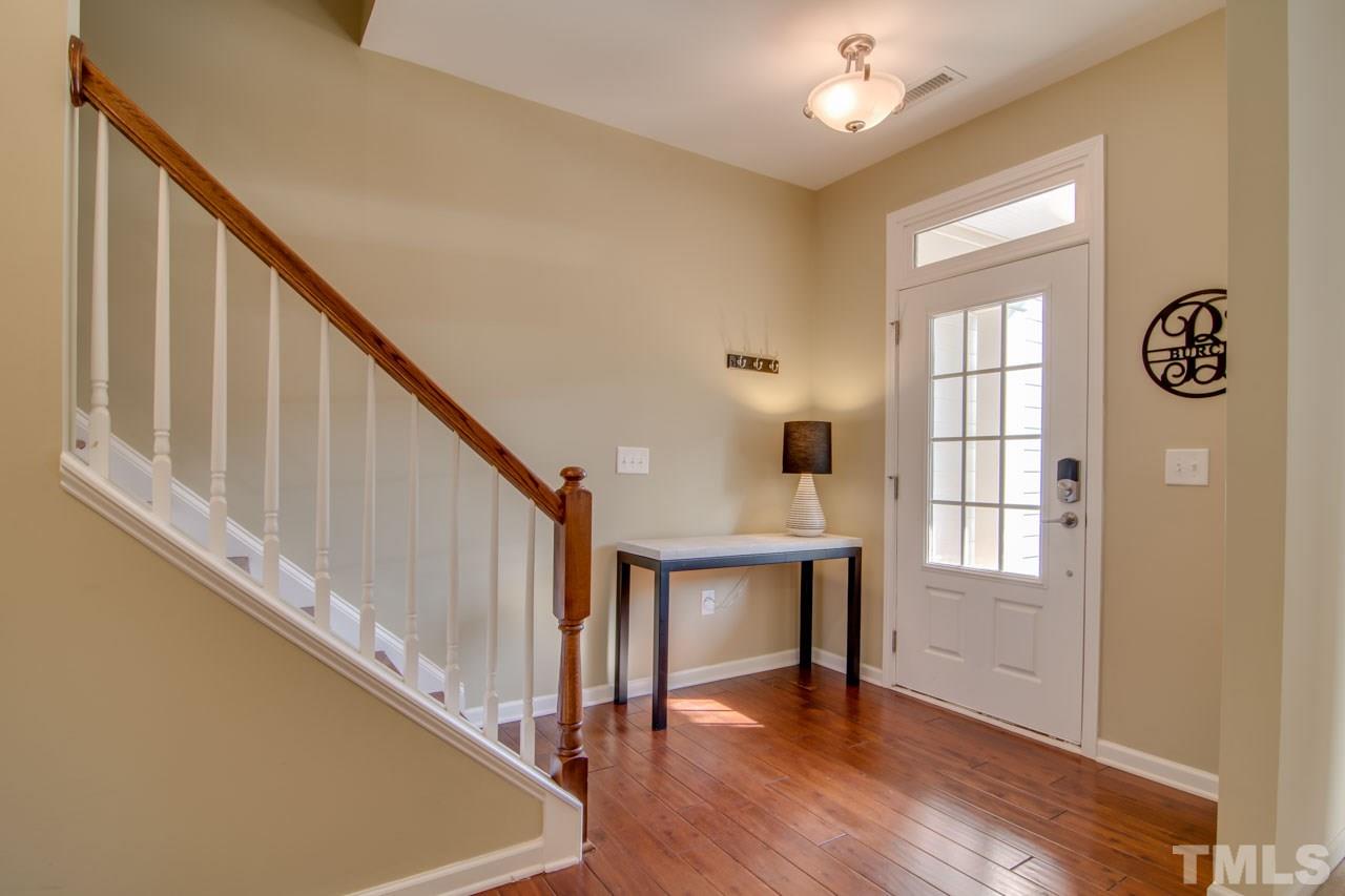 1308 Cornell Place Raleigh, NC 27607 - Photo 3 of 25 a view of entryway with wooden floor