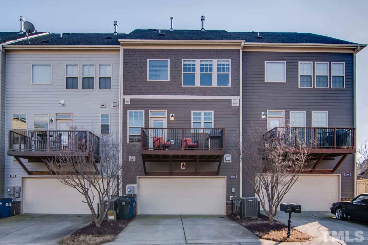 1308 Cornell Place Raleigh, NC 27607 - Photo 22 of 25 a front view of a house with outdoor seating