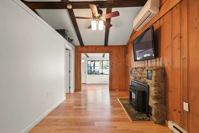 a view of an entryway with a fireplace
