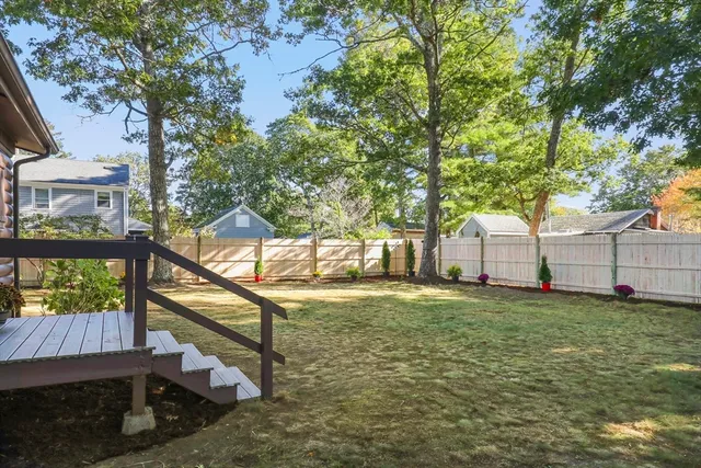 a house view with a garden space