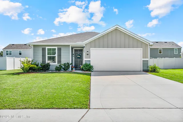 a view of backyard with garden and plants