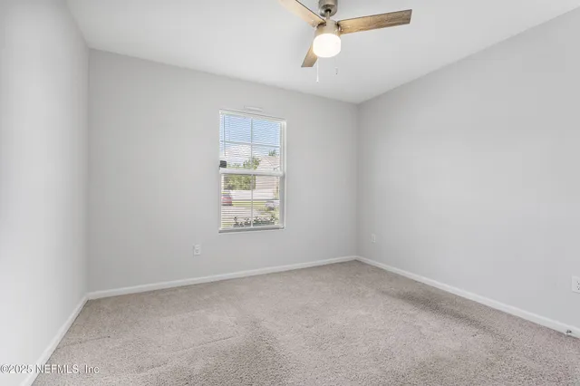 a bathroom with a sink toilet a shower and a mirror