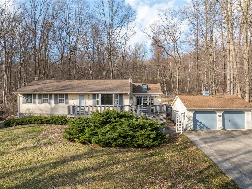 4416 Highway 819 Avonmore, PA 15618 - Photo 2 of 46 a front view of a house with a garden