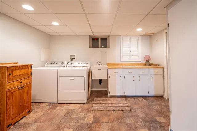 a utility room with dryer and washer