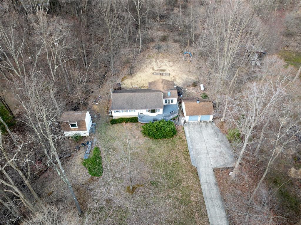 4416 Highway 819 Avonmore, PA 15618 - Photo 45 of 46 an aerial view of a house with a yard and large tree