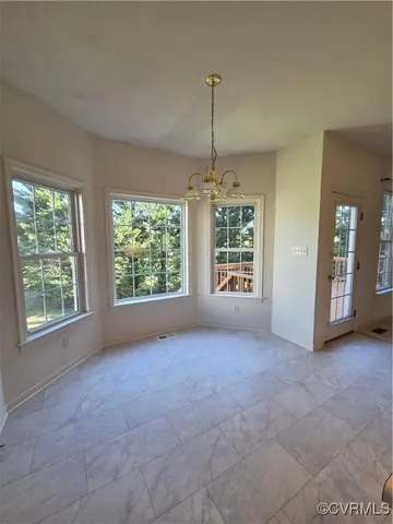 a bathroom with a sink mirror vanity and toilet