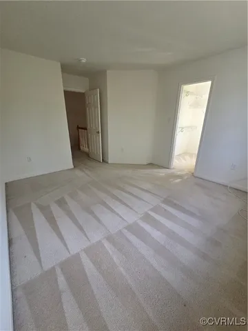 a bathroom with a bath tub with a shower