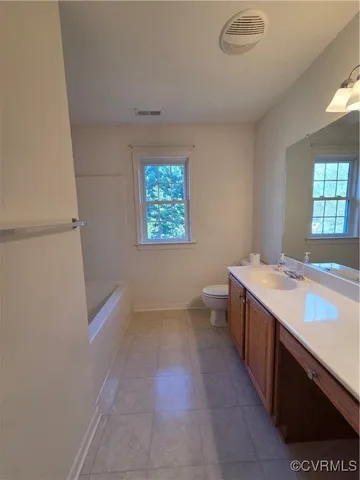 a view of a bench in a garden