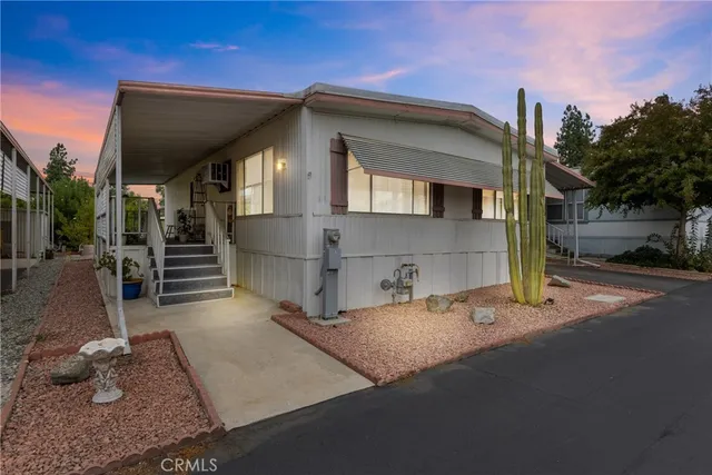 a yellow house with outdoor space