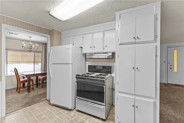 a view of an empty room with a bathroom