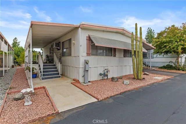 a big room with closet and windows