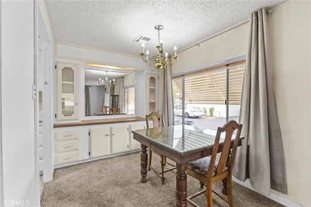a kitchen with sink cabinets and window