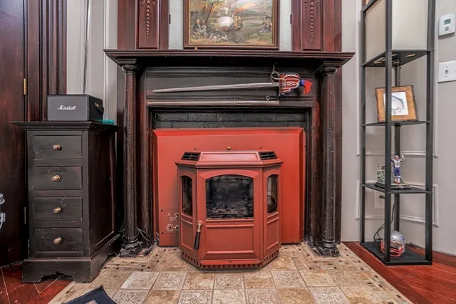 a stove top oven sitting inside of a kitchen