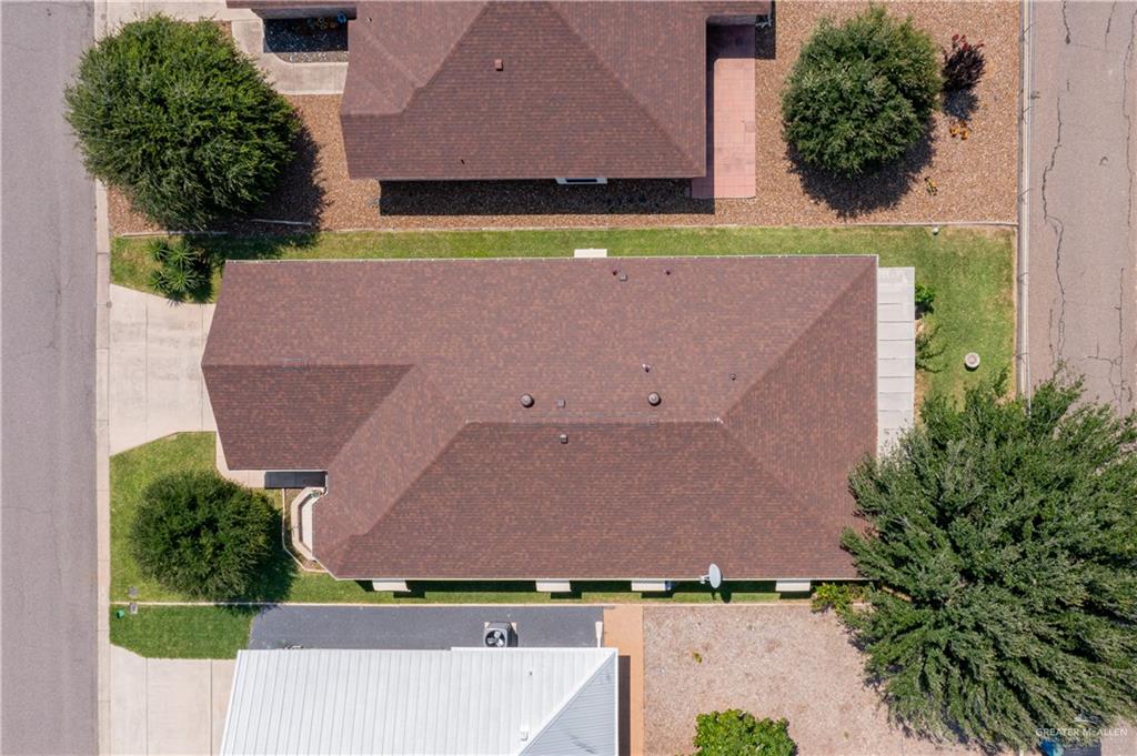 1717 Sun Street Mission, TX 78572 - Photo 17 of 19 an aerial view of a house with a garden