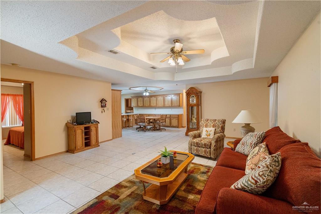 1717 Sun Street Mission, TX 78572 - Photo 7 of 19 a living room with furniture and wooden floor