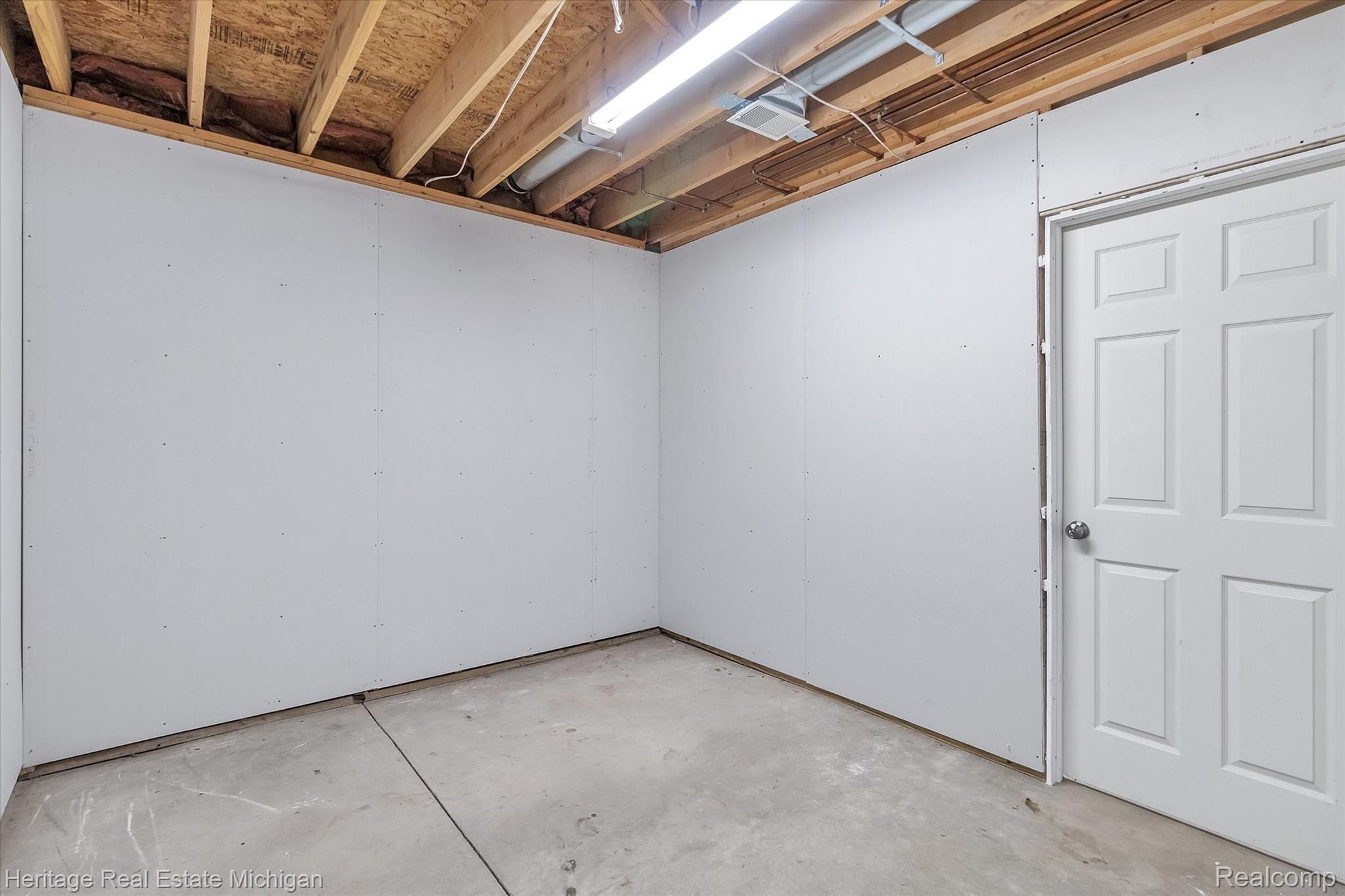 3800 Brighton Road Howell, MI 48843 - Photo 41 of 56 Basement storage room