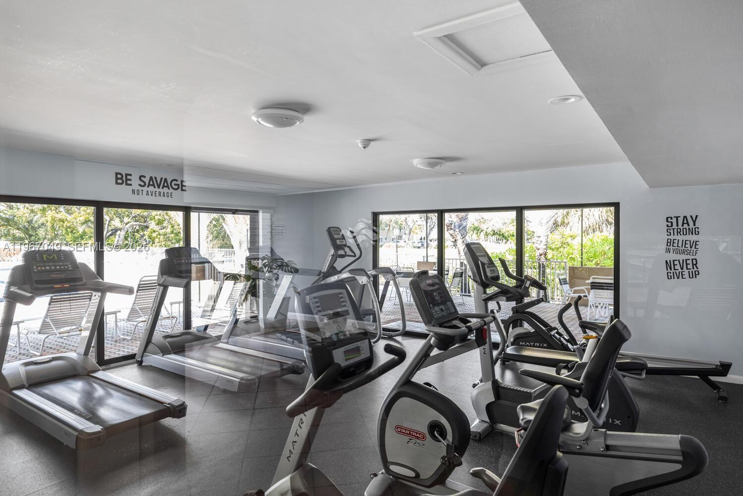 7785 Southwest 86th Street, Unit E119 Miami, FL 33143 - Photo 33 of 33 a view of a room with gym equipment