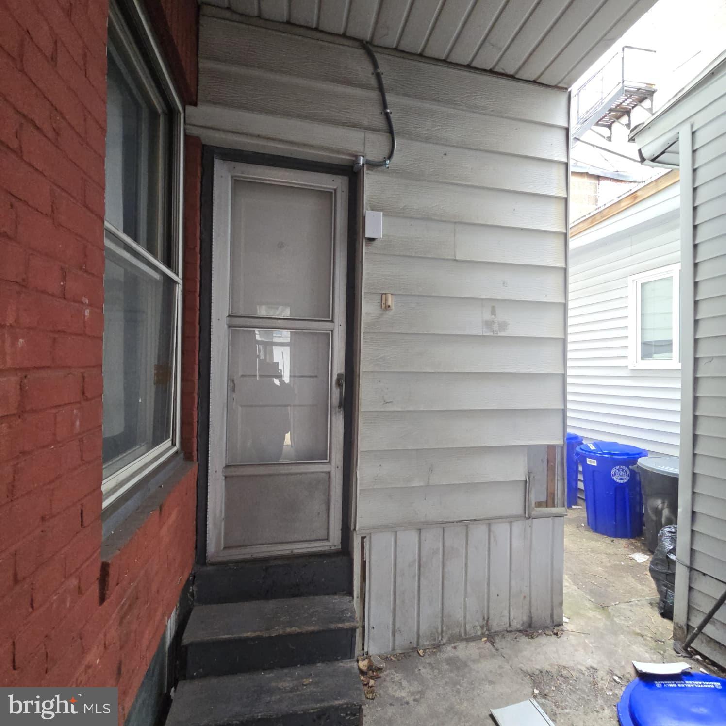 343 Chestnut Street Reading, PA 19602 - Photo 13 of 16 a front view of a house with a window