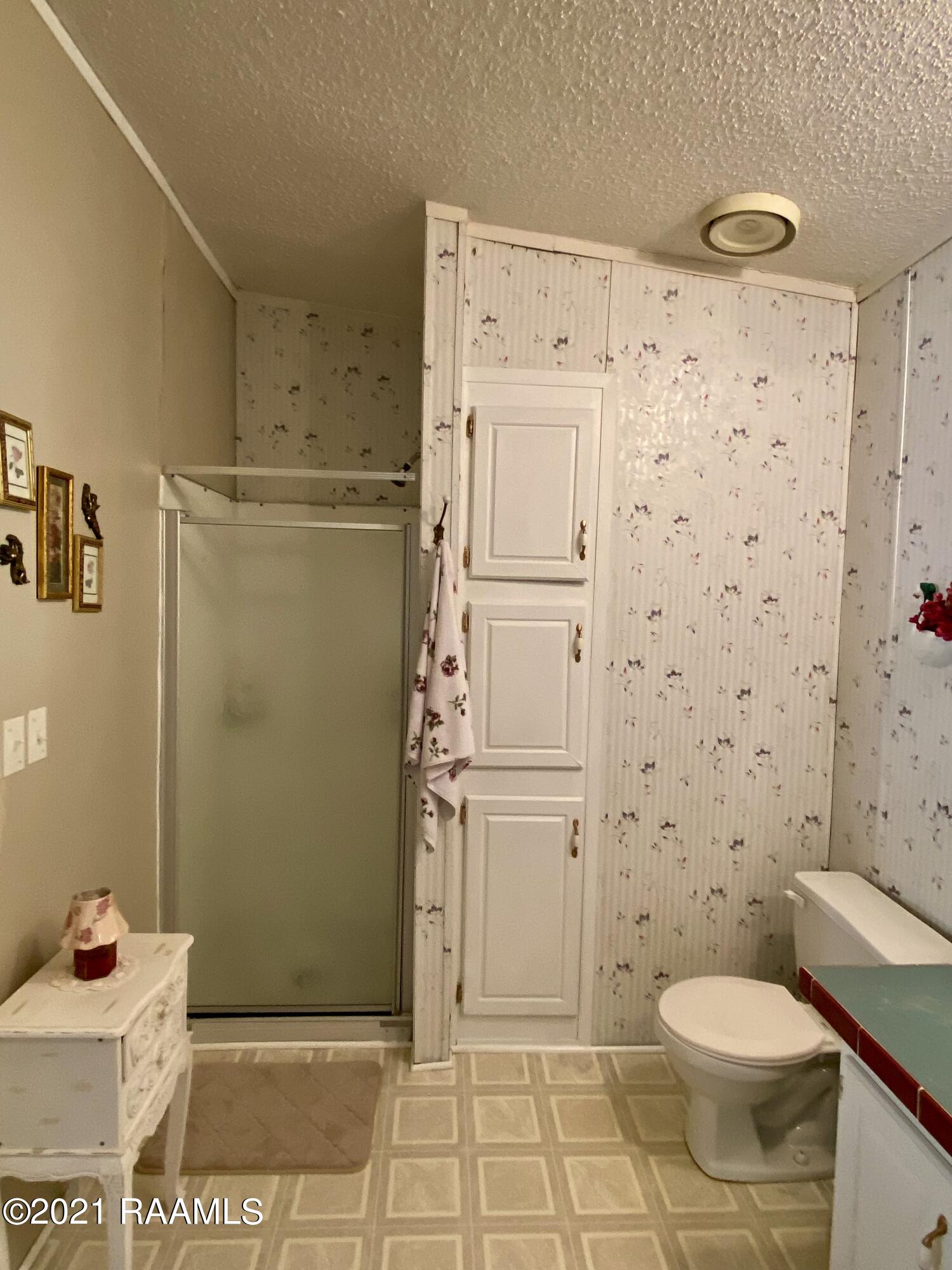 11308 Wesley Road Abbeville, LA 70510 - Photo 13 of 24 Separate shower in master bathroom