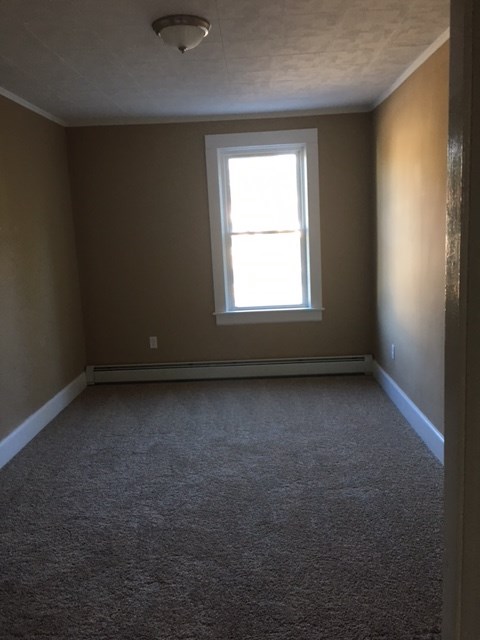 97 Ward Street Woonsocket, RI 02895 - Photo 12 of 17 New Carpet in 3 Bedrooms in 2nd floor
