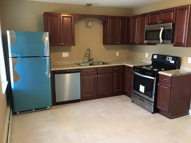 97 Ward Street Woonsocket, RI 02895 - Photo 3 of 17 New Cherry Kitchen with New Stainless Steel Appliances