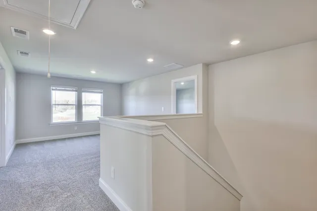 a view of hallway with window