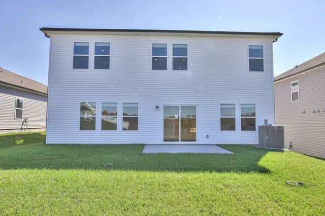 a brick building that has a lots of windows in it