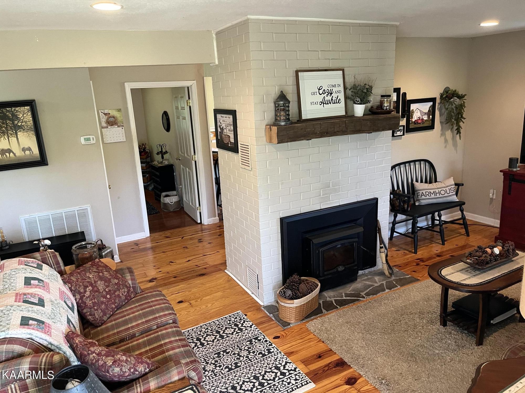 4700 Sunnyside Road Philadelphia, TN 37846 - Photo 11 of 48 a bedroom with furniture and a fireplace