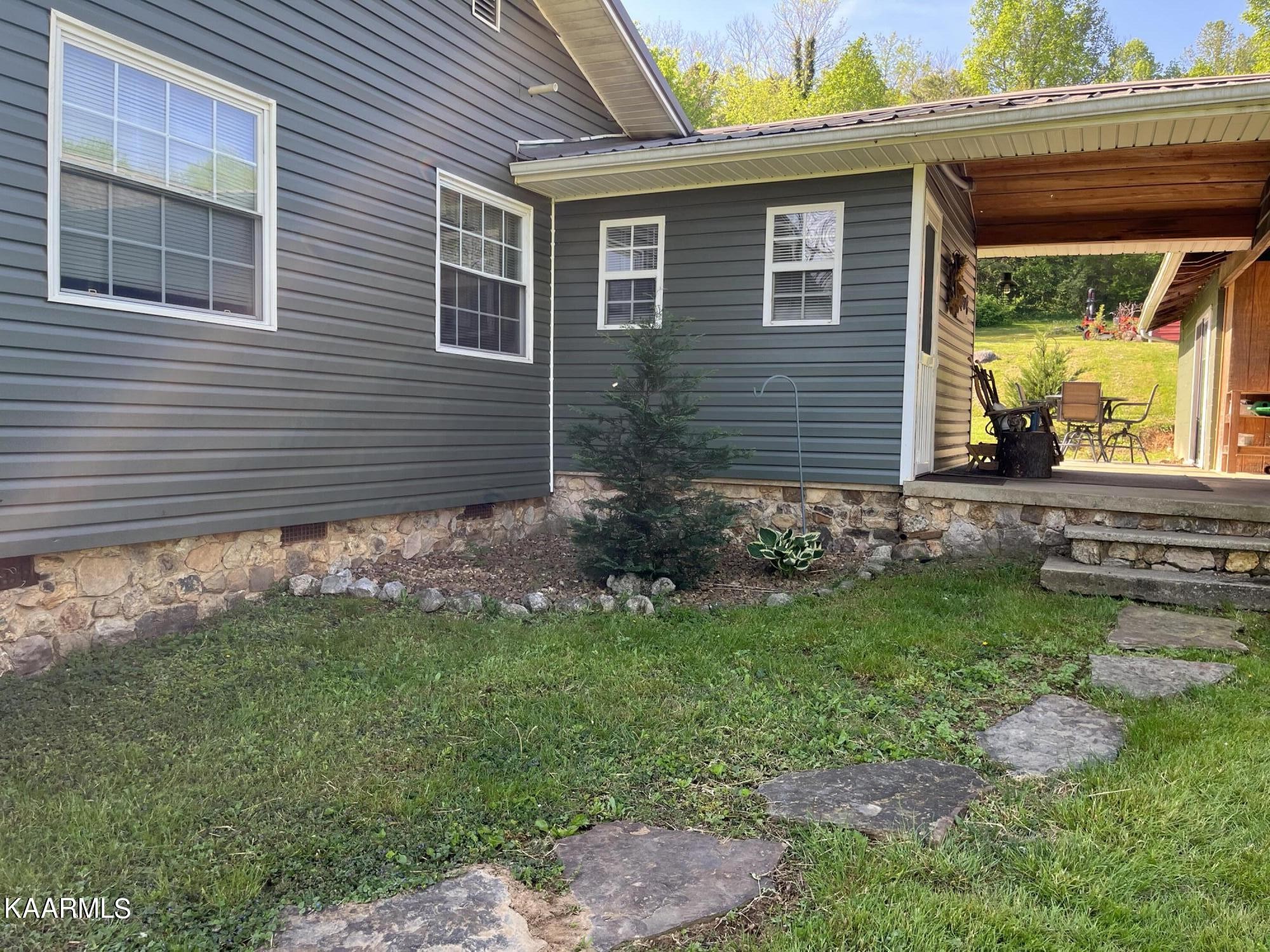 4700 Sunnyside Road Philadelphia, TN 37846 - Photo 24 of 48 a view of a house with a yard