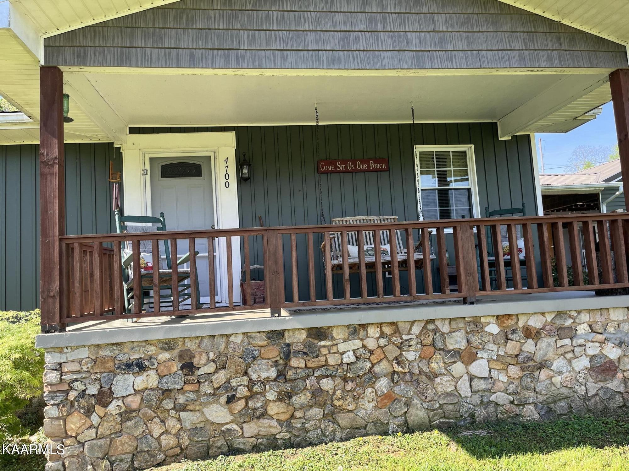 4700 Sunnyside Road Philadelphia, TN 37846 - Photo 25 of 48 a view of a wooden house with a wooden fence