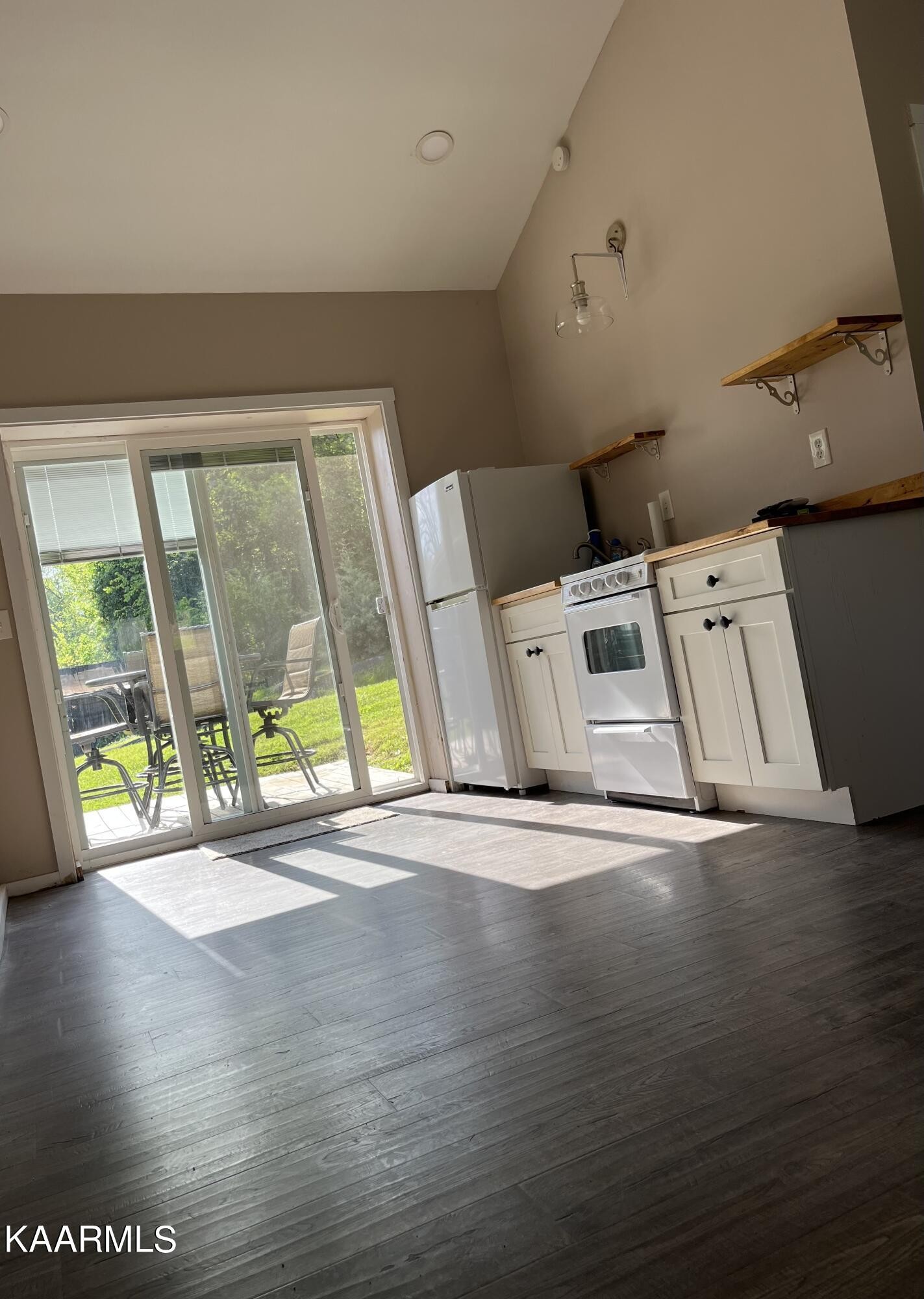 4700 Sunnyside Road Philadelphia, TN 37846 - Photo 30 of 48 a view of an empty room with wooden floor and a window