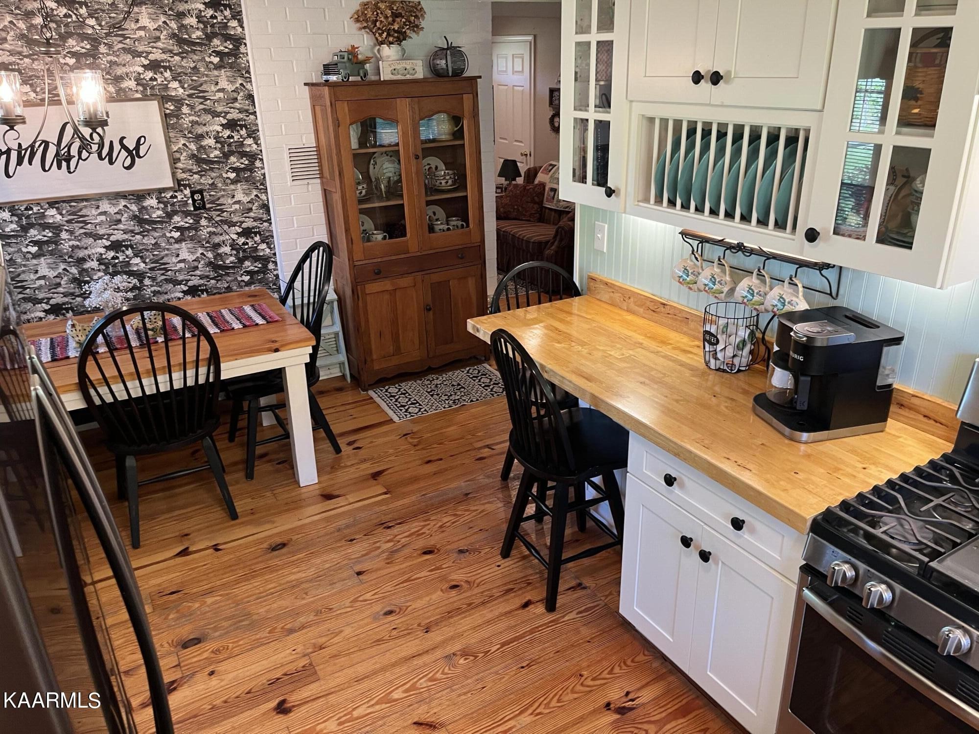 4700 Sunnyside Road Philadelphia, TN 37846 - Photo 4 of 48 a view of a dining room with furniture and wooden floor