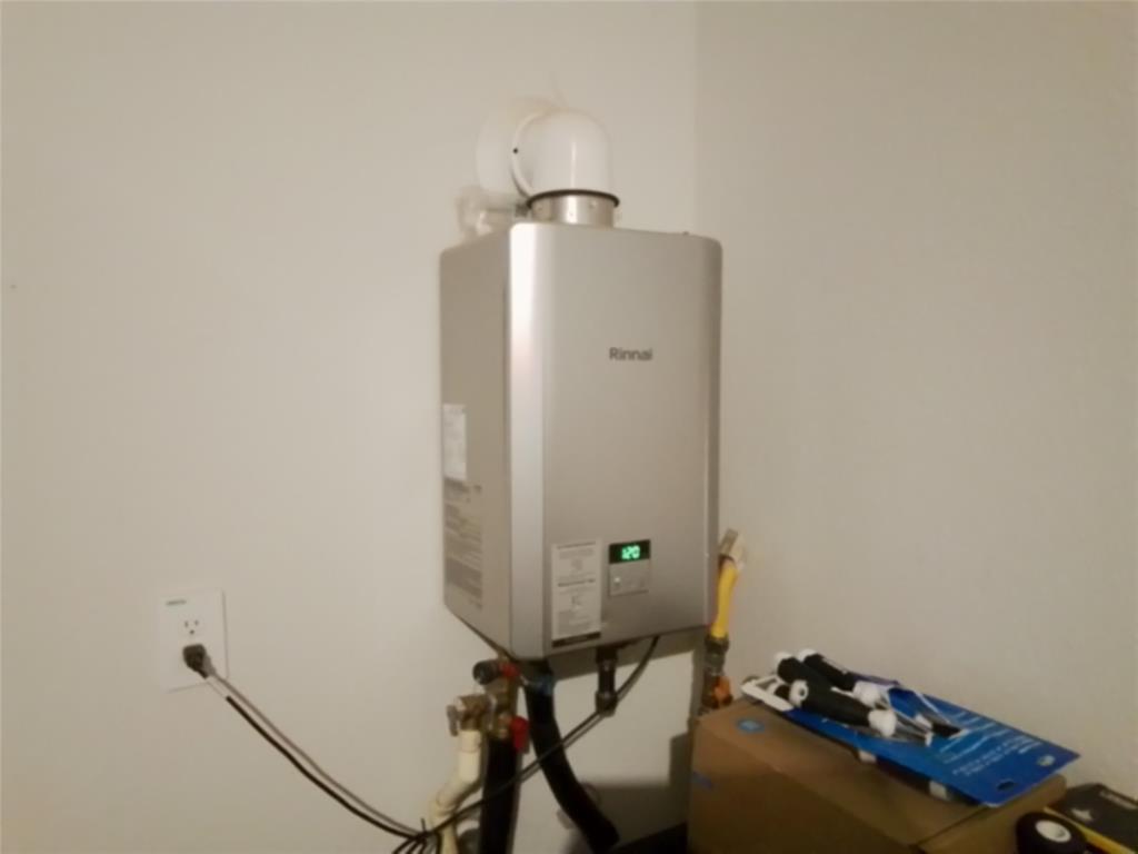 9712 Quail Pointe Road Aubrey, TX 76227 - Photo 12 of 22 Tankless water heater