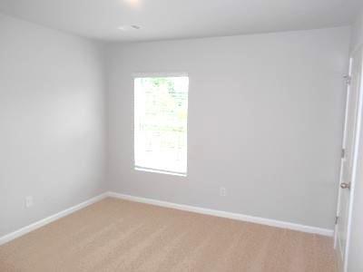 177 Valley View Circle Dallas, GA 30132 - Photo 13 of 23 an empty room with a window