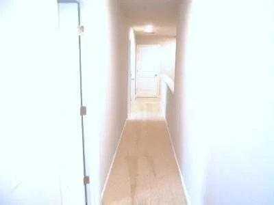 a picture of a bathroom with a shower