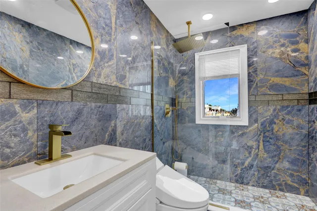 an aerial view of a house with a garden