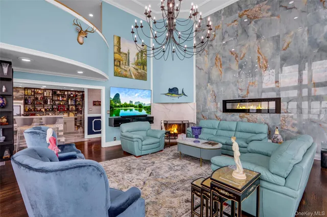 a kitchen with stainless steel appliances granite countertop a kitchen island a stove a sink a dining table and chairs