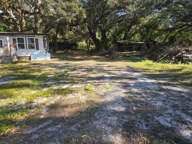 a view of a house with a swimming pool