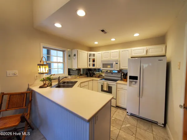 $940,000 | 403 Emerald Landing Drive, Emerald Isle, NC 28594