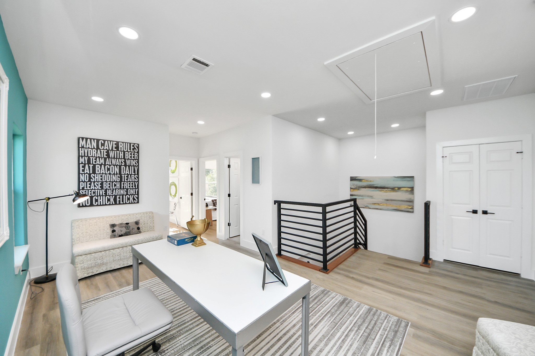 9305 Jutland Road Houston, TX 77033 - Photo 17 of 41 a living room with furniture and a wooden floor