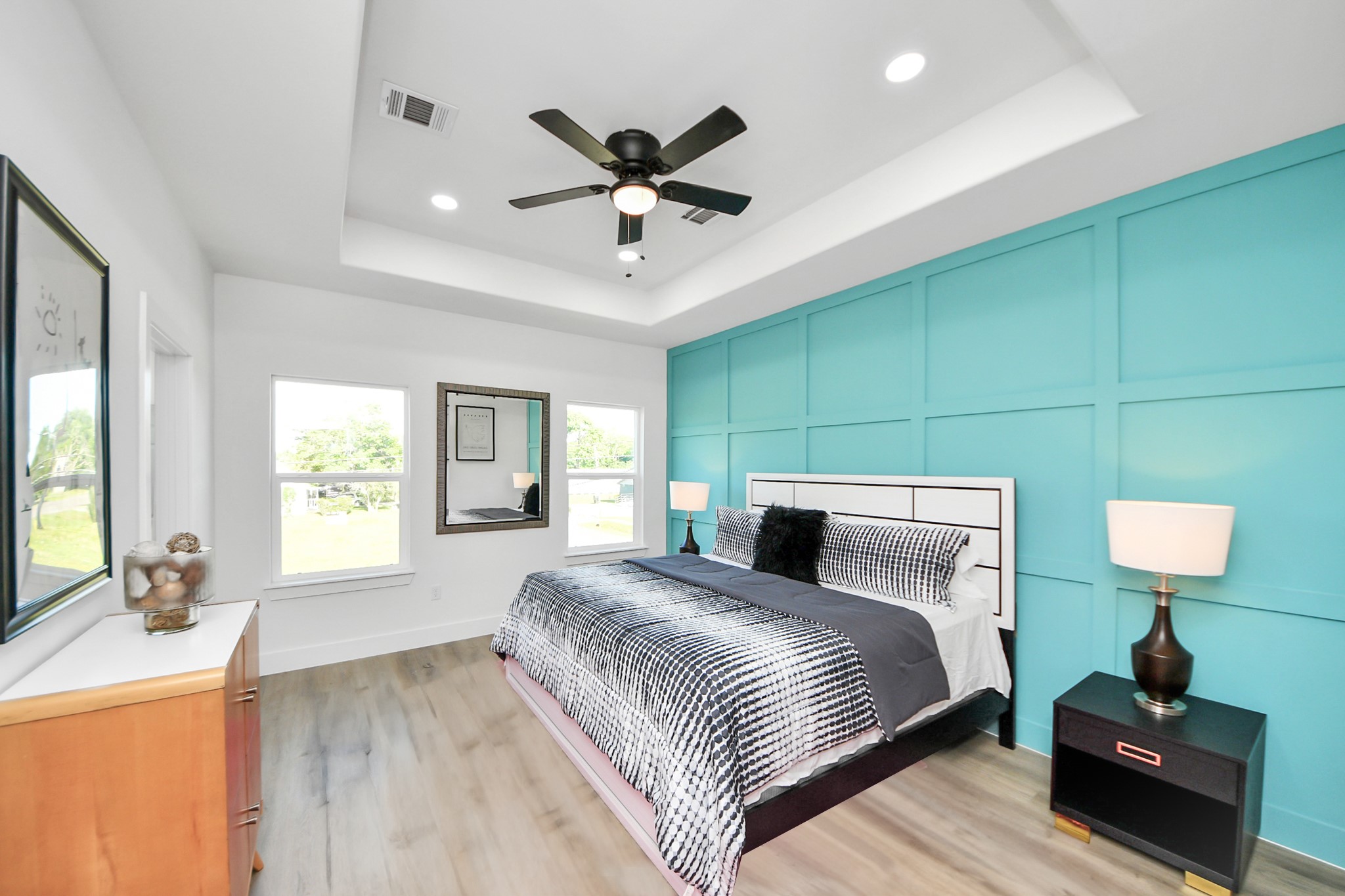 9305 Jutland Road Houston, TX 77033 - Photo 22 of 41 a bedroom with a large bed and a window