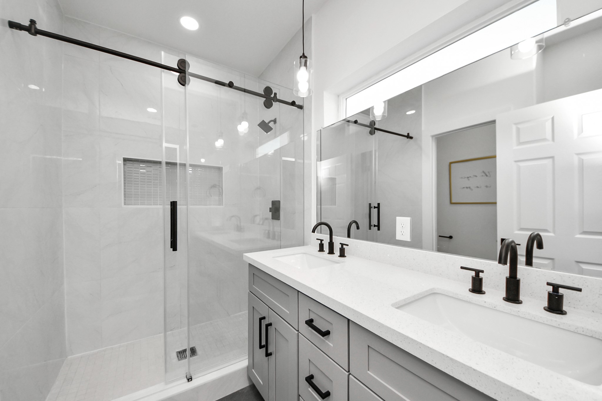 9305 Jutland Road Houston, TX 77033 - Photo 25 of 41 a bathroom with a sink double vanity and shower