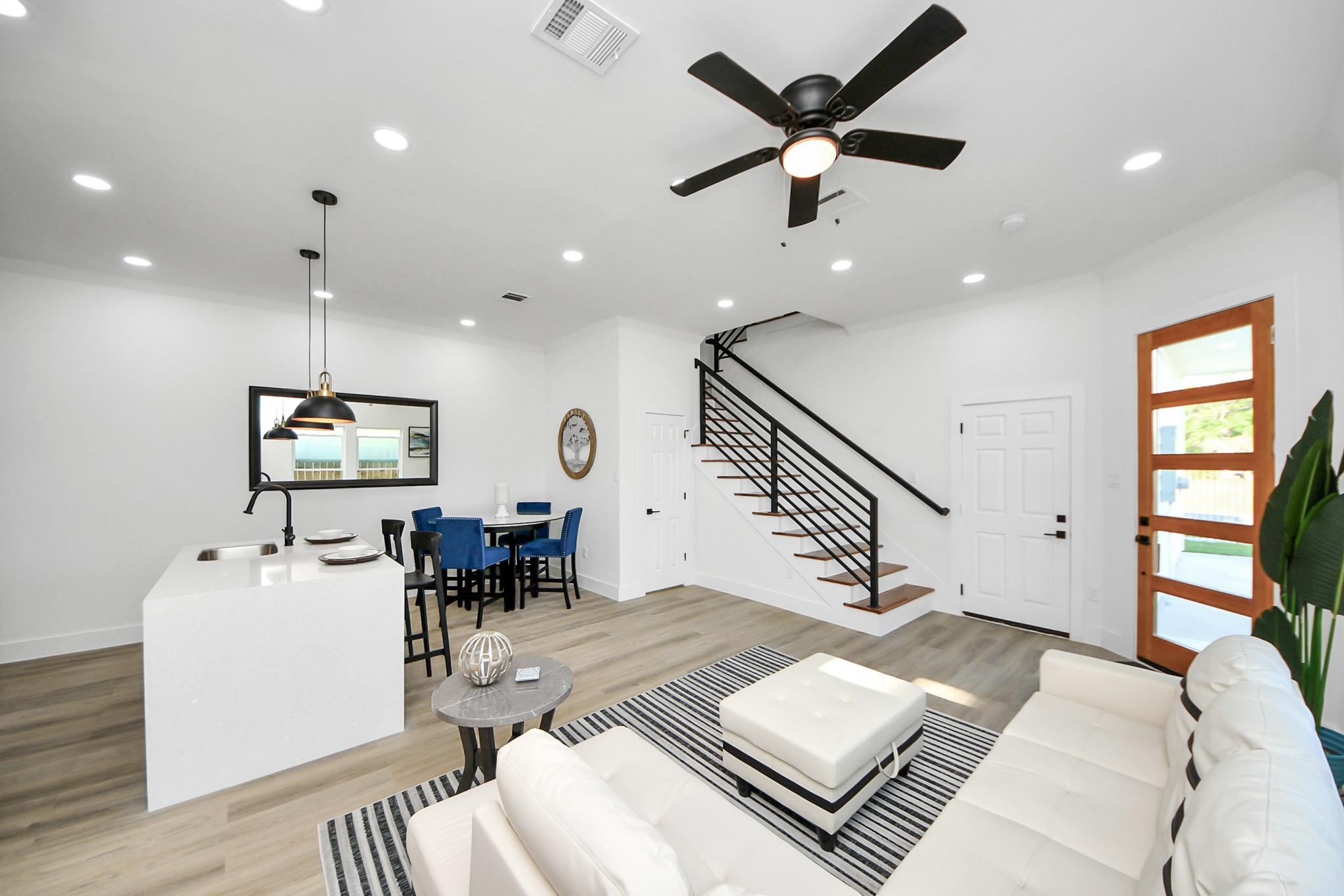 9305 Jutland Road Houston, TX 77033 - Photo 3 of 41 a living room with furniture and wooden floor