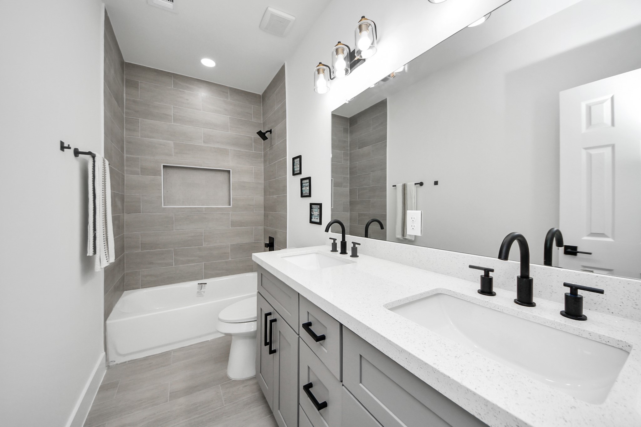 9305 Jutland Road Houston, TX 77033 - Photo 31 of 41 a bathroom with a sink a toilet and shower