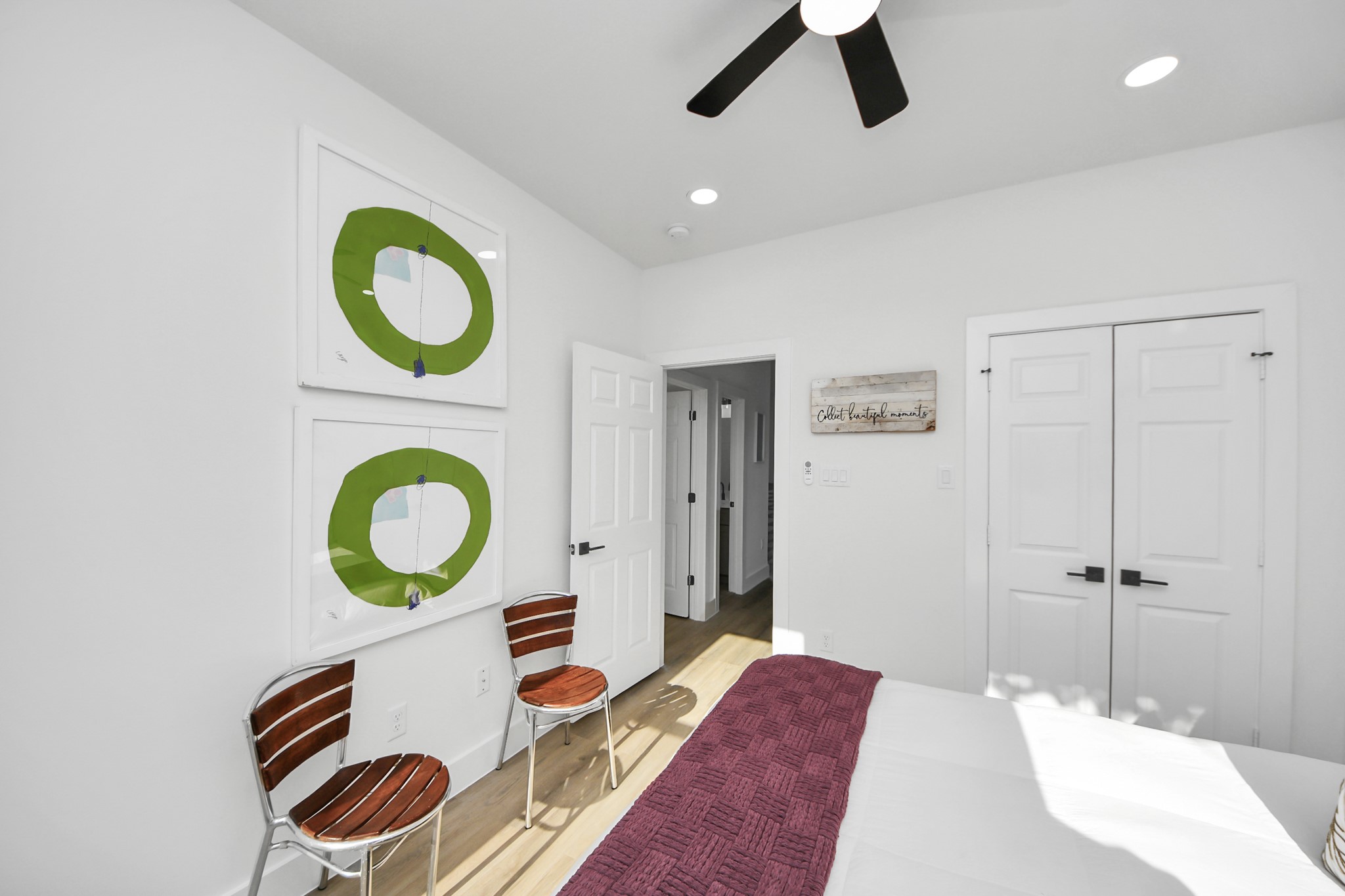 9305 Jutland Road Houston, TX 77033 - Photo 34 of 41 a bedroom with a bed cabinets and window