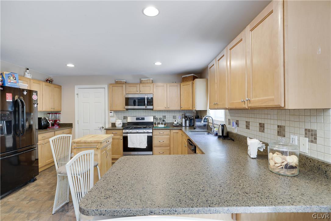 625 Buckle Boot Road Henryville, PA 18332 - Photo 11 of 40 a kitchen with counter top space cabinets and appliances