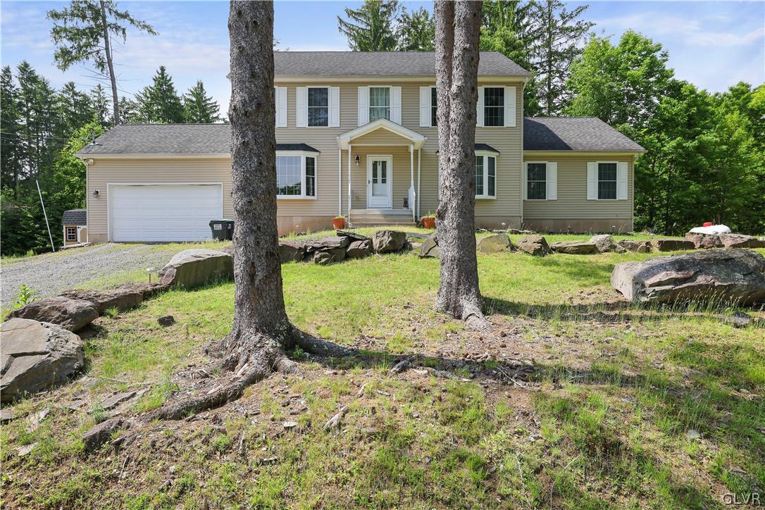 625 Buckle Boot Road Henryville, PA 18332 - Photo 40 of 40 a front view of a house with garden