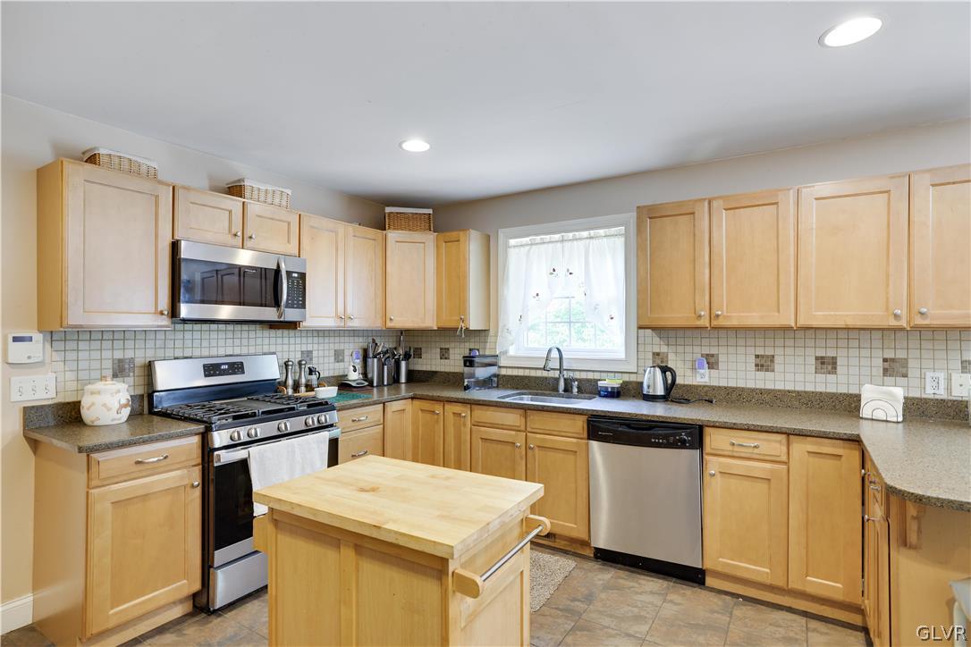 625 Buckle Boot Road Henryville, PA 18332 - Photo 7 of 40 a kitchen with a sink stove top oven and microwave