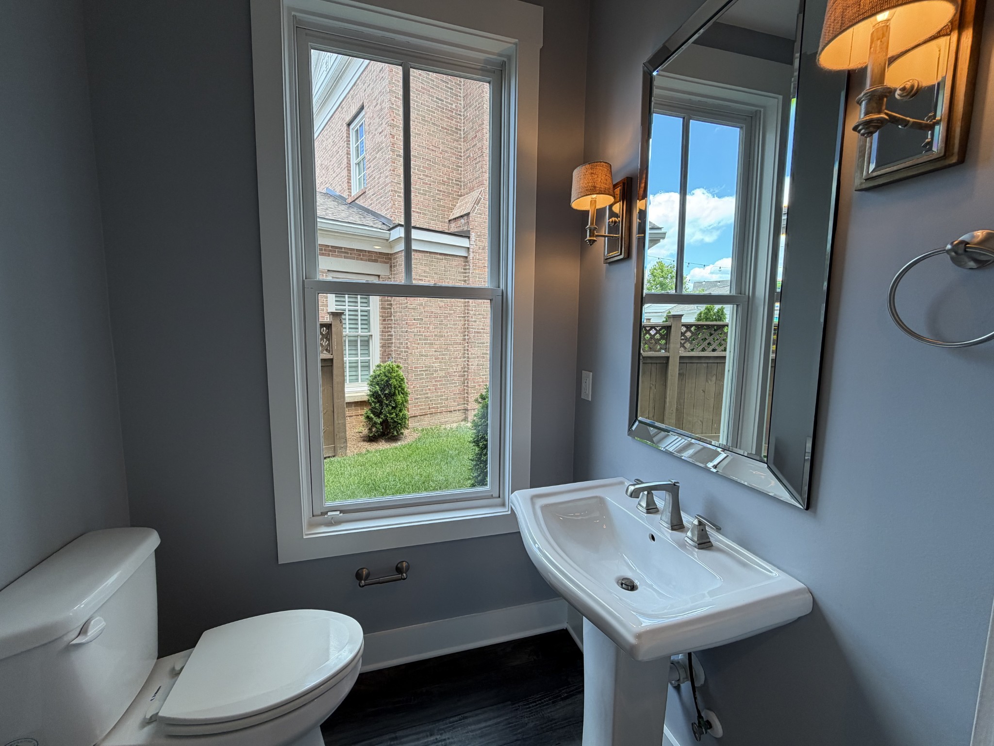 3097 Rural Plains Circle Franklin, TN 37064 - Photo 10 of 28 a bathroom with a toilet a sink and a mirror